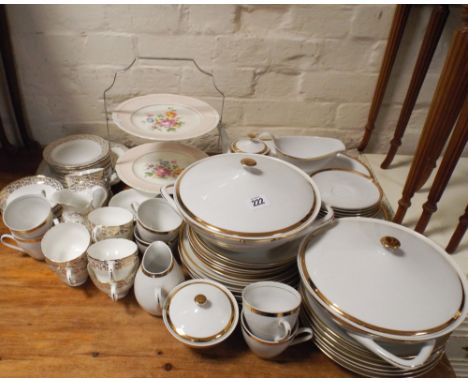 A white and gilt bordered dinner and tea service, gilt decorated tea set and a china cake stand