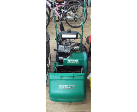 Qualcast classic petrol 35 cylinder lawn mower with rear roller 
