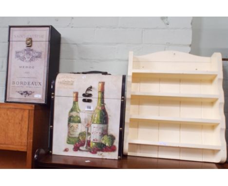 Two wine storage boxes with wine advertising designs and a small shelf 