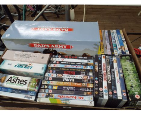 Large box of DVDs to include box sets of Dad's Army etc. 