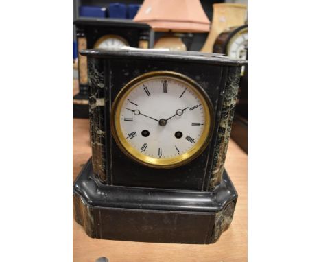 A Victorian slate mantel clock having marble inserts and enamel dial damage to one corner