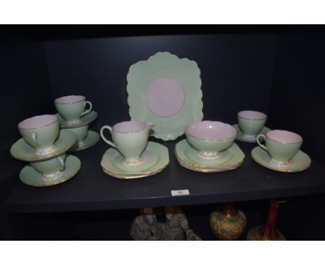 An Art Deco era Foley tea service no.2054 in green and pink colour way.