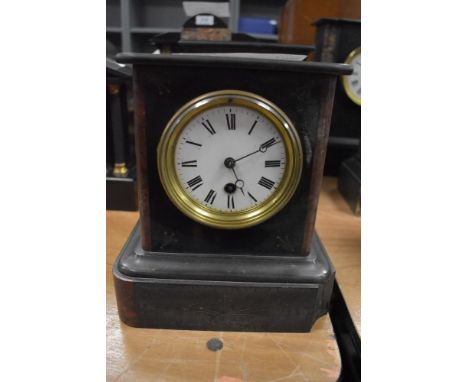 A Victorian French slate mantel clock with red marble inserts having damage to base