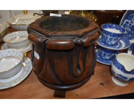 A Victorian elephant foot style wooden planter