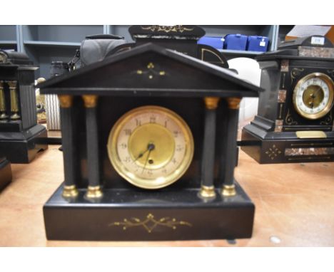 A Victorian slate architectural 1890's mantel clock with German movement