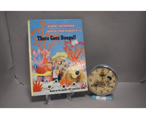 A mid century Magic Roundabout alarm clock and a There Goes Dougal story book