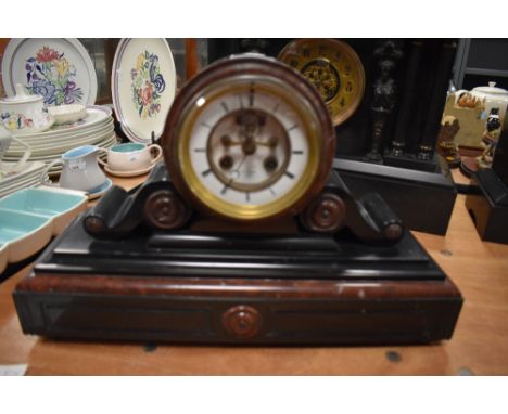 A Victorian drum head slate and red marble mantel clock by Henry Marc Paris, with visible escapement eight day chiming