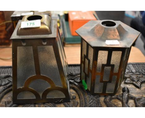 Two Arts and Crafts hall way lanterns or light shades having copper bodies with textured glass.
16cm x 14cm at widest point.
