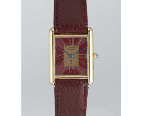 A SOLID SILVER GILT MUST DE CARTIER TANK WRIST WATCHCIRCA 1980s, REF. 55265Movement: Quartz, signed Cartier.Case: Measures ap