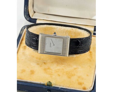 A RARE GENTLEMAN'S 18K SOLID WHITE GOLD BOUCHERON REFLET WRIST WATCHDATED 1966, WITH LONDON IMPORT HALLMARKS & OMEGA MOVEMENT