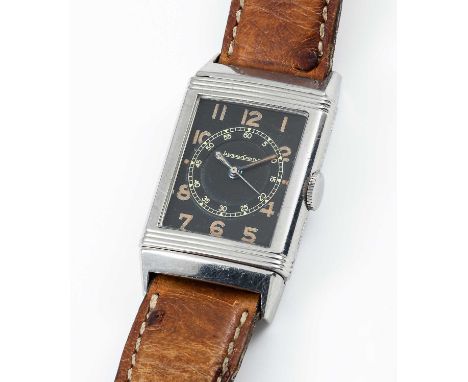 A RARE STAINLESS STEEL JAEGER LECOULTRE REVERSO WRIST WATCHCIRCA 1930s, WITH ORIGINAL BLACK DIAL & CENTER SECONDSMovement: 15