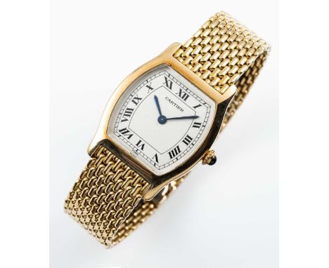 A FINE GENTLEMAN'S SIZE 18K SOLID GOLD CARTIER PARIS TORTUE MECANIQUE BRACELET WATCHCIRCA 1980sMovement: Manual wind, signed 