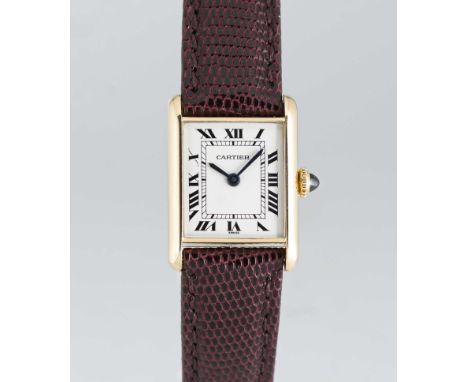 A LADIES 18K SOLID GOLD CARTIER PARIS TANK LOUIS MECANQIUE WRIST WATCHCIRCA 1980, REF. 67117Movement: Manual wind, signed Car