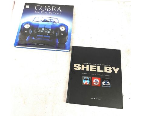 Two hardback car books includes the complete book of shelby by colin comer, cobra the first 40 years book