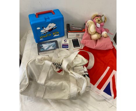 Large selection of British airway memorabilia includes concord clocks, money box, cufflinks, uniform hats and a selection of 