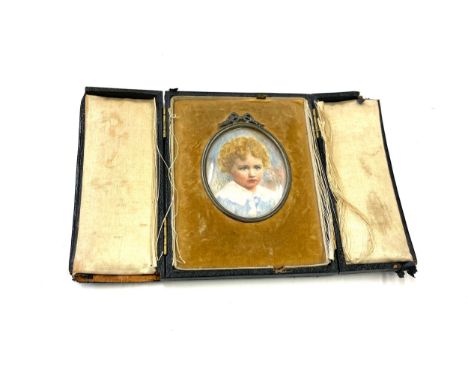 Original hand painted portrait miniature of a young boy in leather case 