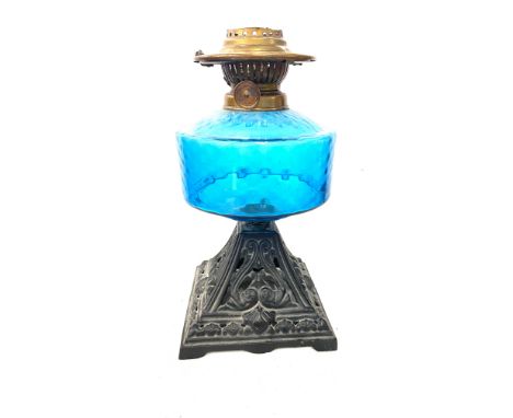 Vintage blue glass oil lamp with cast iron base, not complete, height approx 11.5inches tall