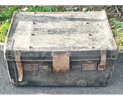 Antique leather bound travel trunk, approximate measurements: Height 14 inches, Width 27 inches, Depth 18.5 inches