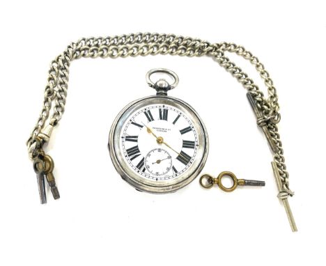 Vintage Freeman &amp; Co London silver pocket watch, hallmarked, with a Albert chain 