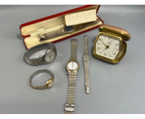5 various men and ladies watches and side travel clock 