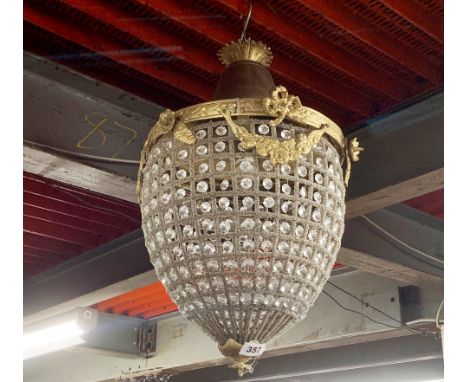 A brass and glass ceiling light fitting, H. 50cm.
