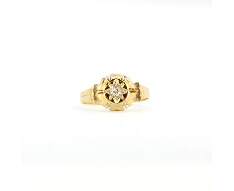 An antique hallmarked 18ct yellow gold ring set with an old cut diamond, (K.5).