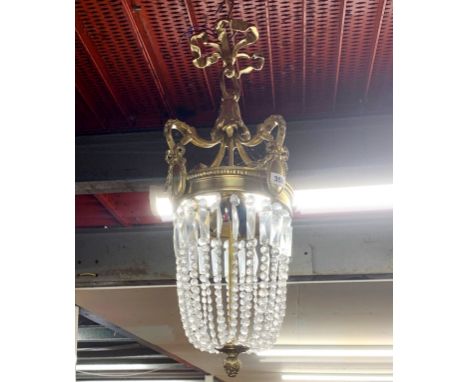 A heavy quality brass and cut glass ceiling light fitting, H. 70cm.