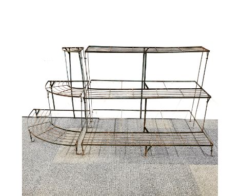 A vintage wrought iron florists outside display stand, 100 x 76cm together with a matching wrought iron corner display/ plant
