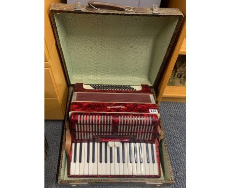 A cased Worldmaster piano accordion, case W. 50cm.