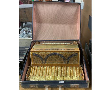 A cased Settimio piano accordion, W. 53cm.