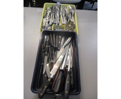 A quantity of flatware to include Kings pattern cutlery and a white metal bangle 
