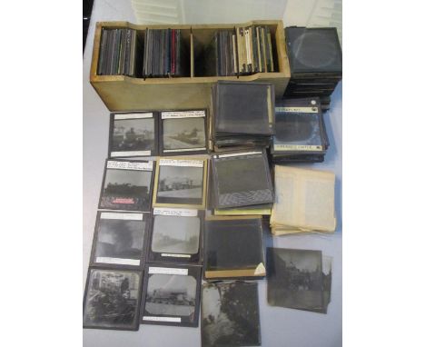 Approximately 160 early 20th century and later magic lantern slides and glass plates of varied subject matter includes scenic