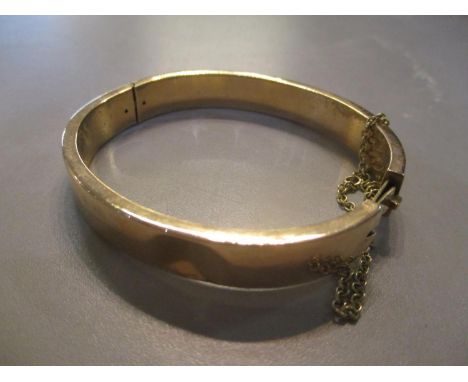 A 15ct gold bangle 15.9g 