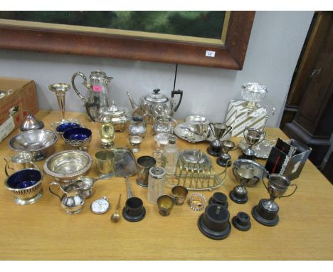 A quantity of silver plate to include a teapot, coffee pot, trophy cups and other items, along with a Derrick pocket watch 