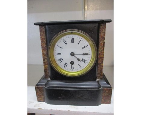 A Victorian black polished slate and marble mantle clock 