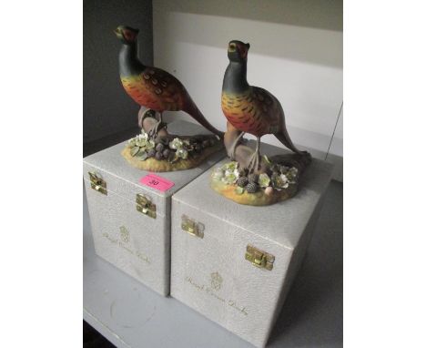 Two boxed Royal Crown Derby Pheasant models, signed K Wood and C Komarnicki 