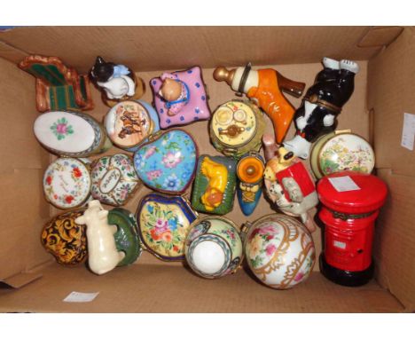A box containing a collection of enamel and ceramic trinket boxes including Staffordshire Enamels, Limoges, etc.