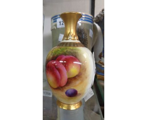 A small Royal Worcester porcelain vase of baluster form with hand painted fruit decoration depicting peaches and cherries to 