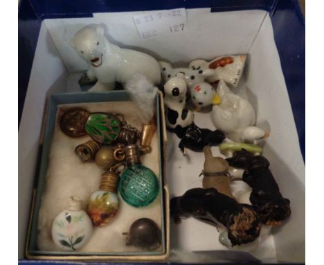 A box containing a quantity of miniature ceramic and other figurines including Wade First Series polar bear cub and swan, gla