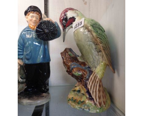 A Beswick firgure depicting a green woodpecker Model No. 1218 - sold with a Royal Doulton figurine Master Sweep HN2205