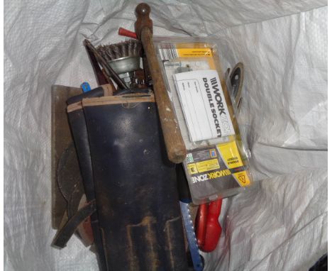 A bag containing a quantity of assorted tools