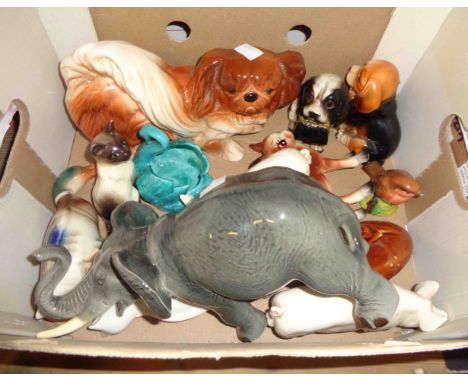 A box containing a quantity of ceramic animals including Melba ware elephant, Beswick pigs, Belleek cat, etc. - various condi