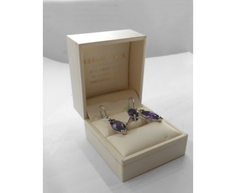 A 375 white gold amethyst ring - size K - boxed - sold with a pair of similar 925 ear-rings