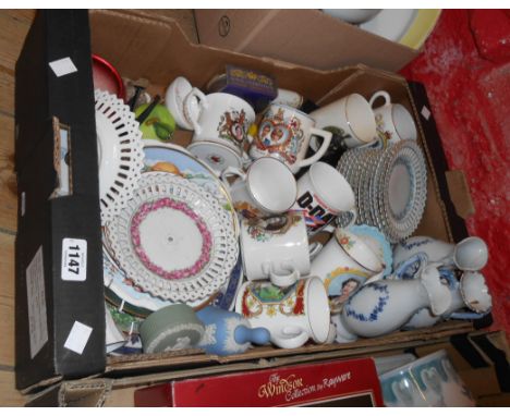 A box containing a quantity of assorted ceramic items including Wedgwood Jasperware, commemorative mugs, etc.