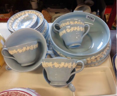 A quantity of Wedgwood embossed Queensware china including cups and saucers, soup bowls, plates, etc.