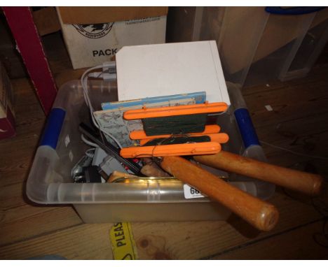 A crate containing a quantity of tools and other assorted items