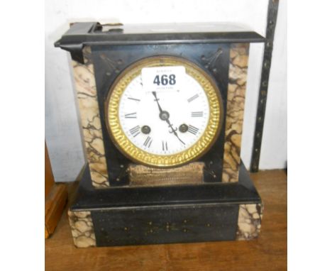 A late Victorian  black slate and marble cased mantle clock with French eight day bell striking movement