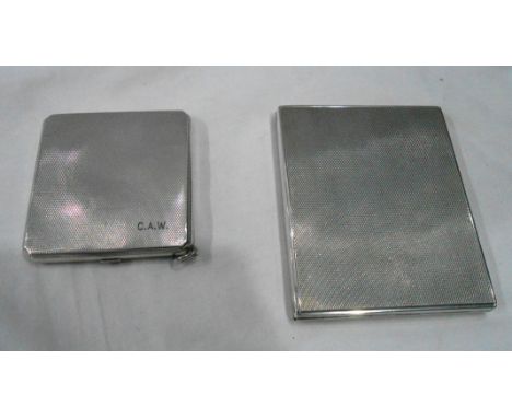 A German marked 800 cigarette case with engine turned decoration - sold with a London silver compact case with engine turned 