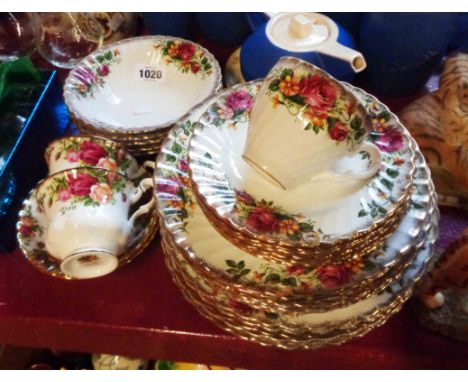 A small quantity of china comprising two Royal Albert Old Country Roses cups and saucers and a quantity of Washington pottery