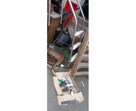 A swimming pool ladder - sold with a box containing nautical navigation lights, anchor, etc.
